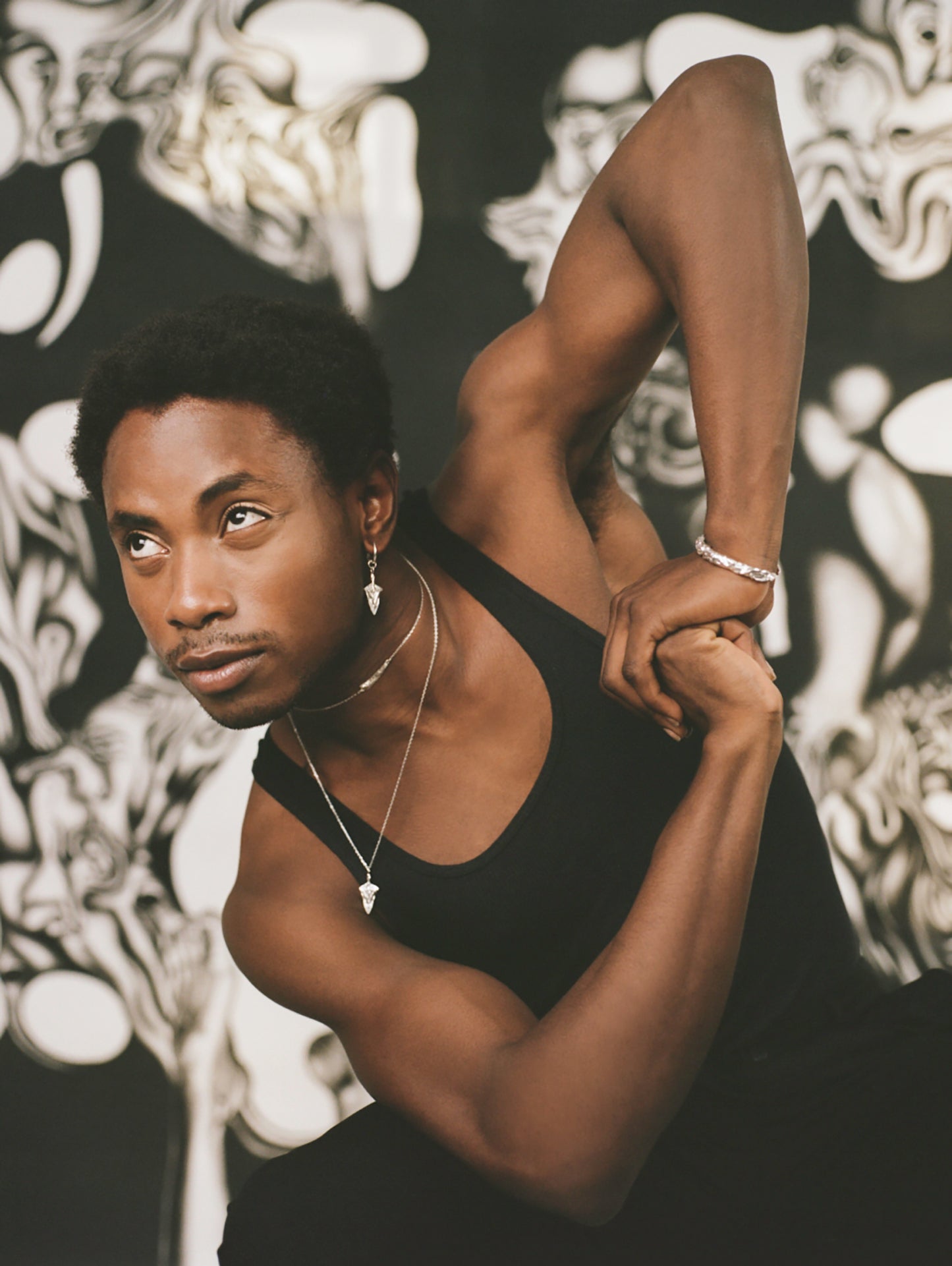 Model wearing layered sterling silver jewellery