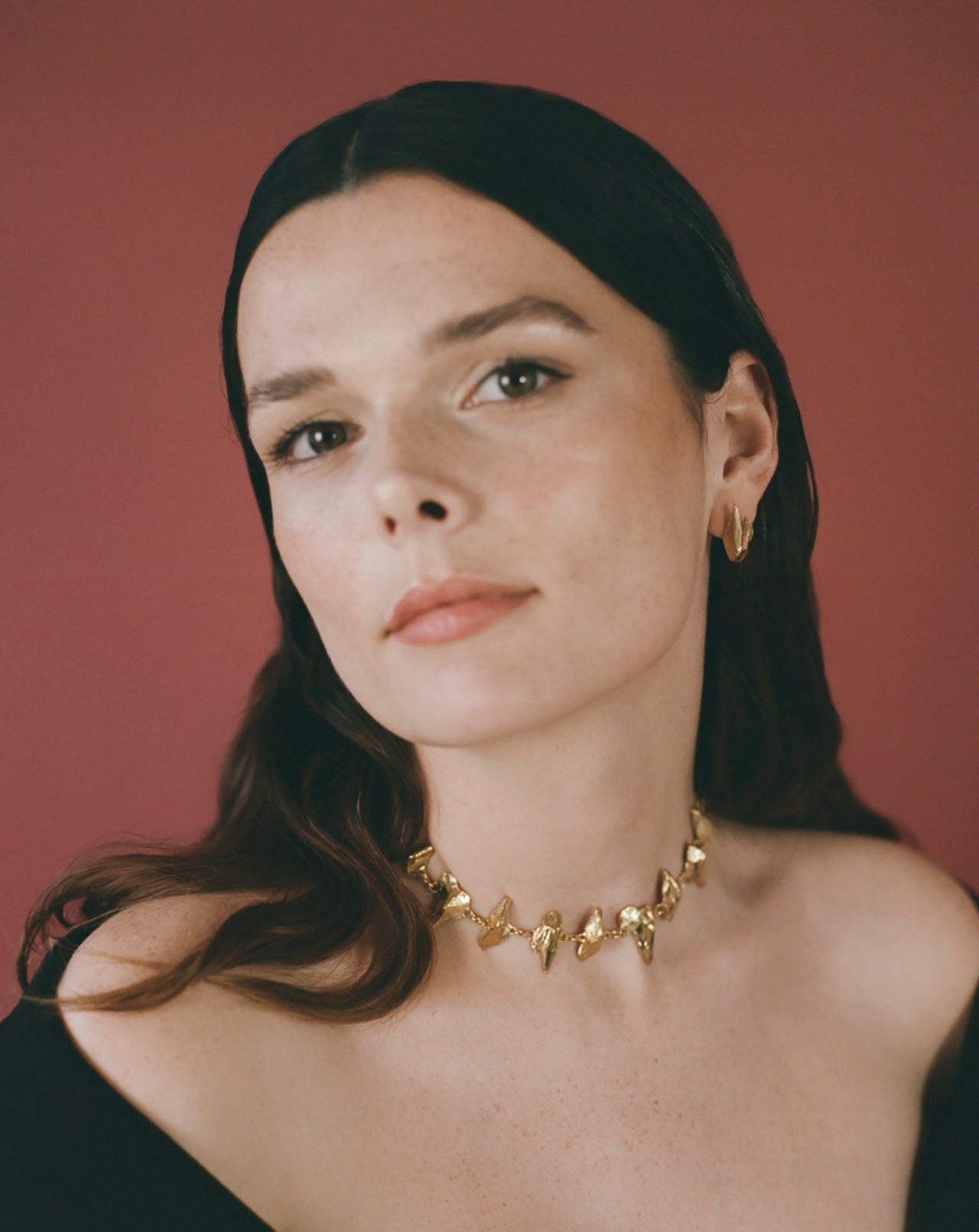 Model wearing handcrafted Irish inspired gold vermeil necklace