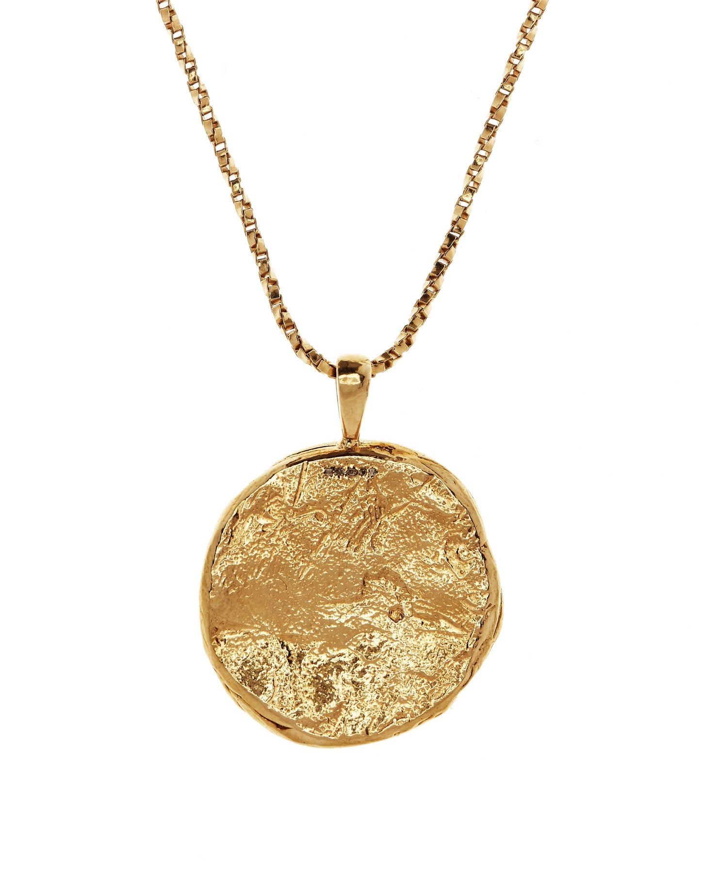 Back view of gold vermeil pendant showing texture