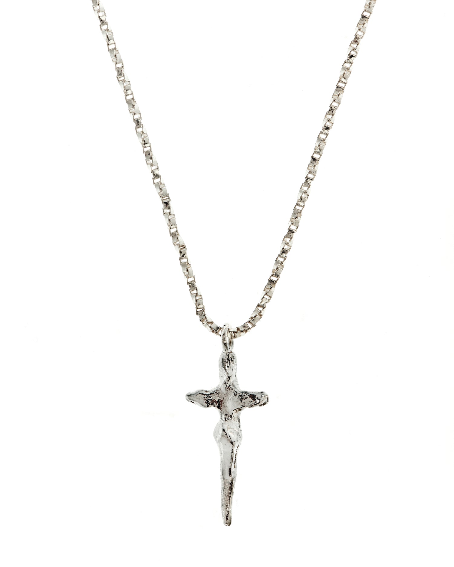 Close up of crucifix necklace in sterling silver