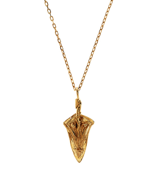 Close up of gold vermeil spear shaped necklace