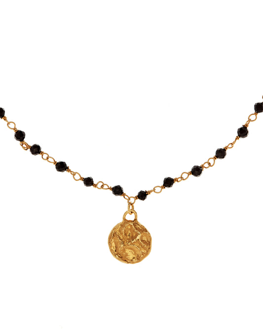 textured gold vermeil pendant on a black beaded chain that sparkles beautifully