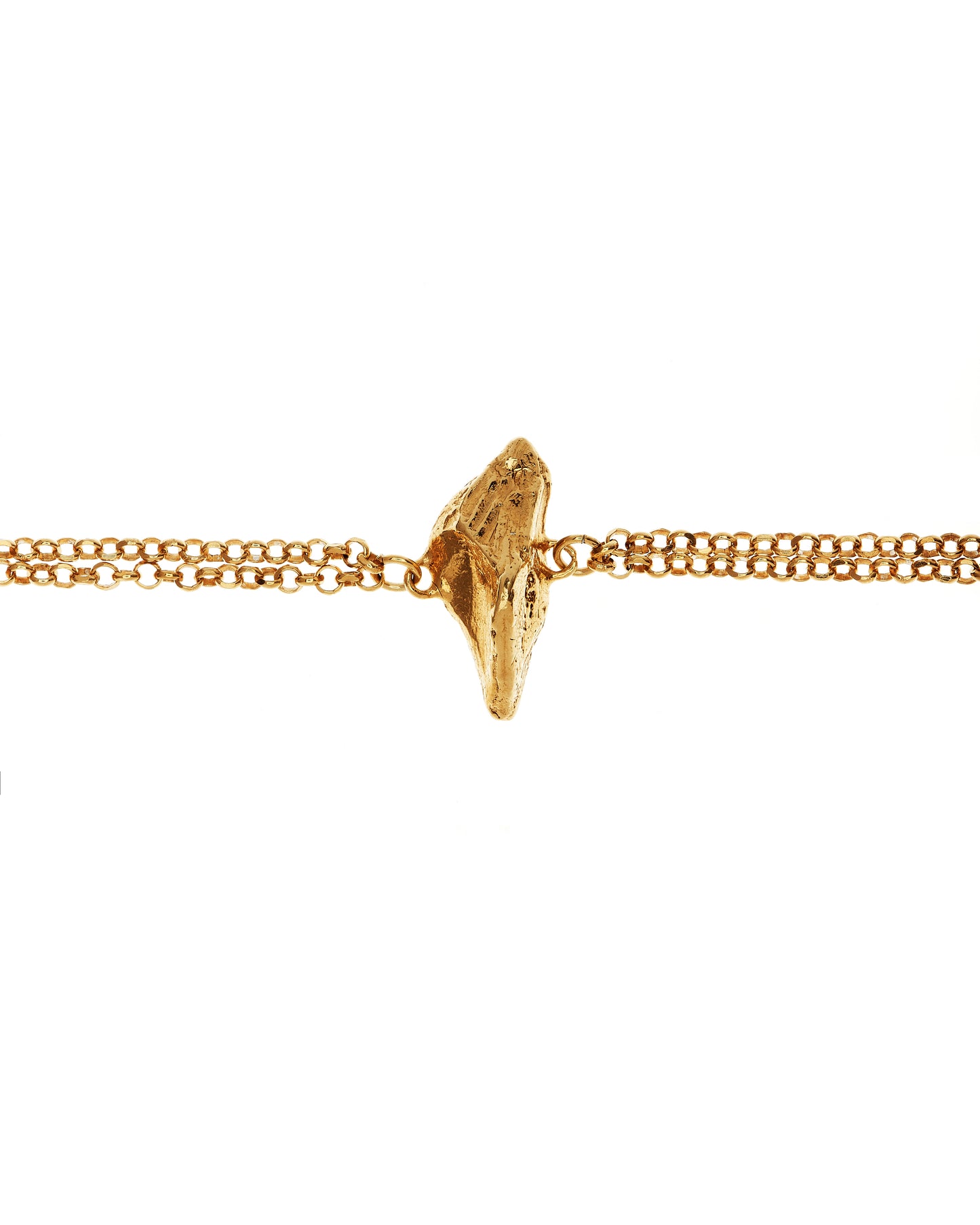 Textured megalithic gold casting