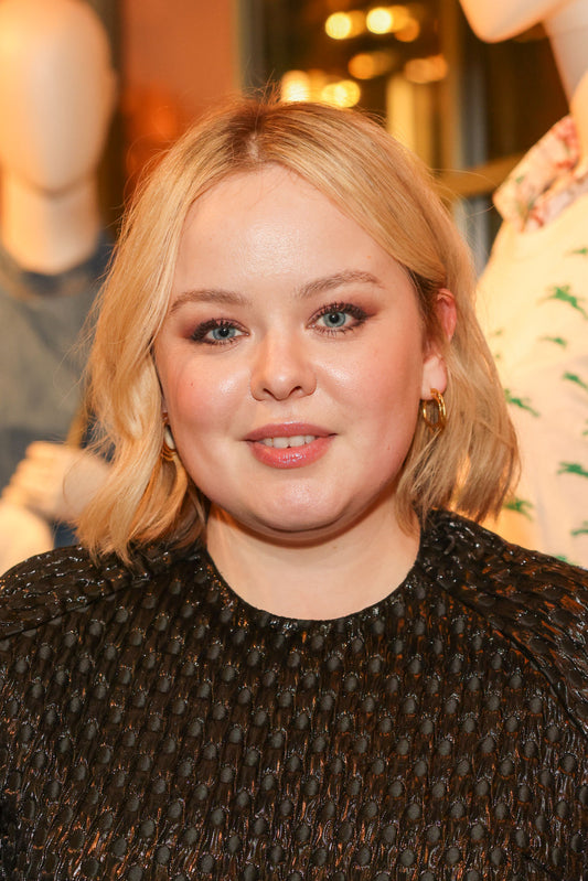 Nicola Coughlan wearing the Sacred Circle Hoops to celebrate Longchamps new collection