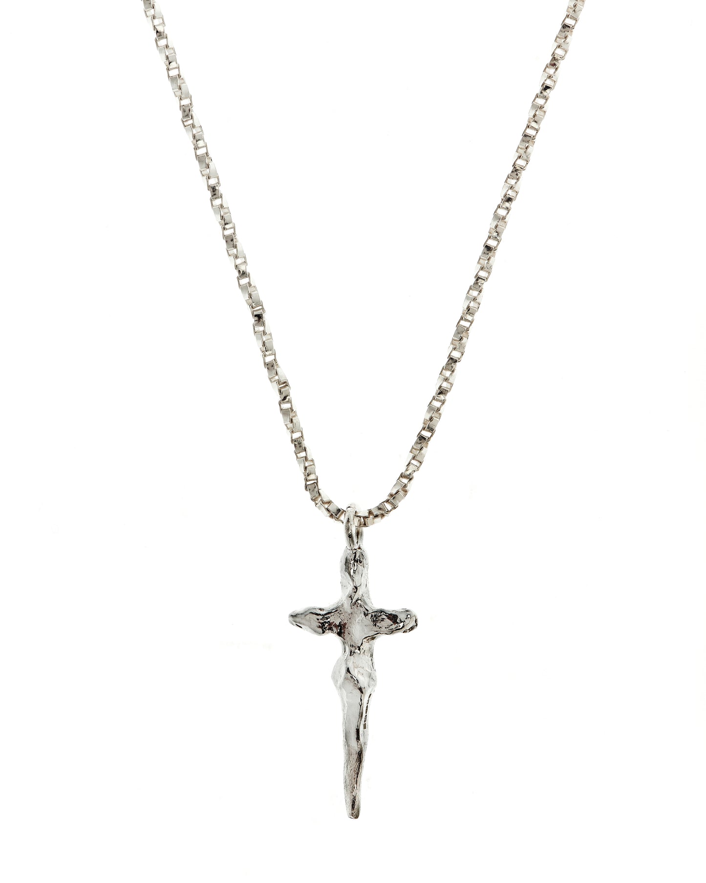 Close up of crucifix necklace in sterling silver