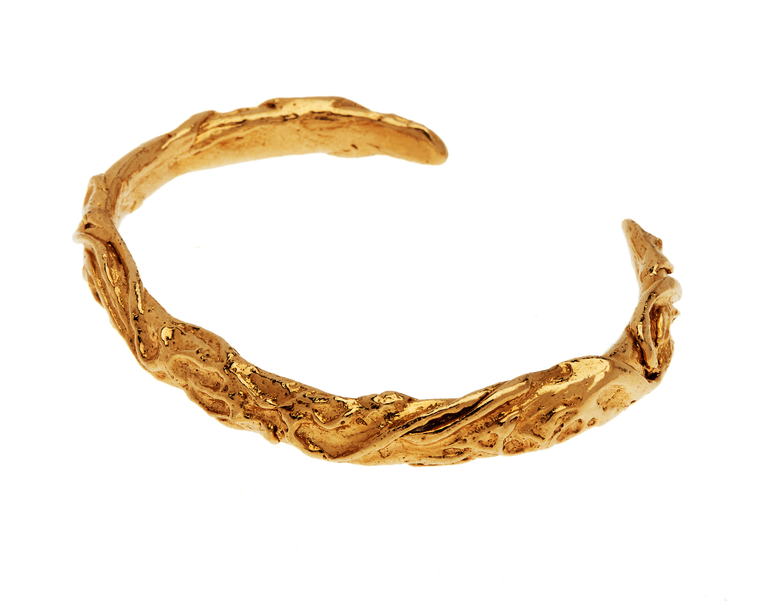 Close up of gold vermeil bangle with ancient Irish symbology