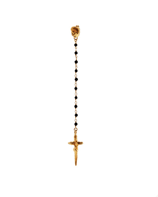 Golden jewellery with black beaded chain and crucifix