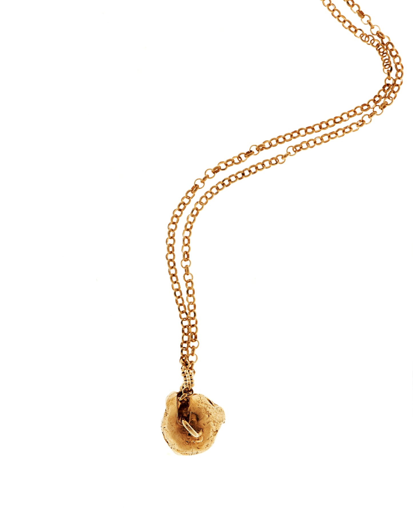 Bird's eye view of pendant and belcher chain in gold vermeil