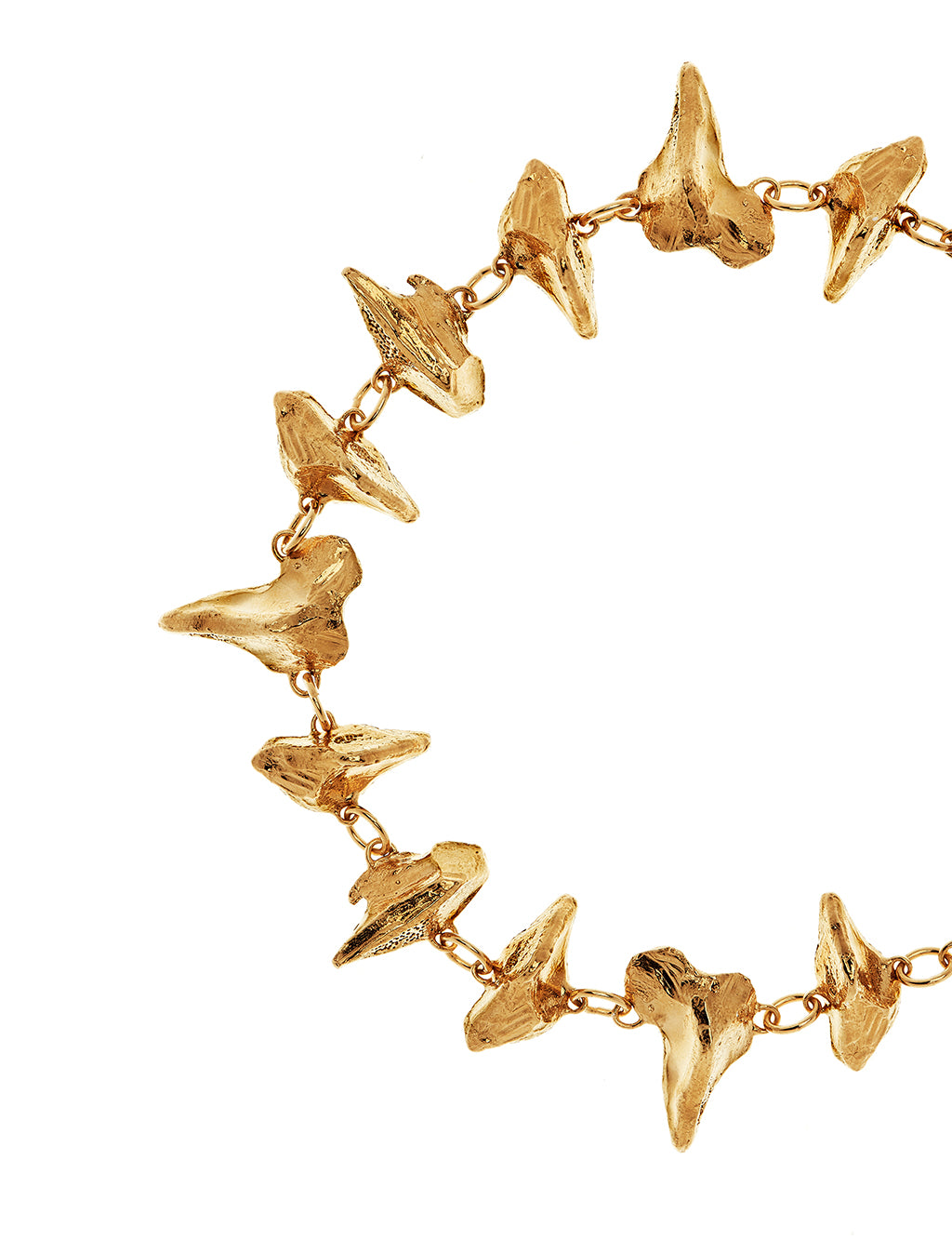 Close up of gold vermeil textured Irish inspired jewellery